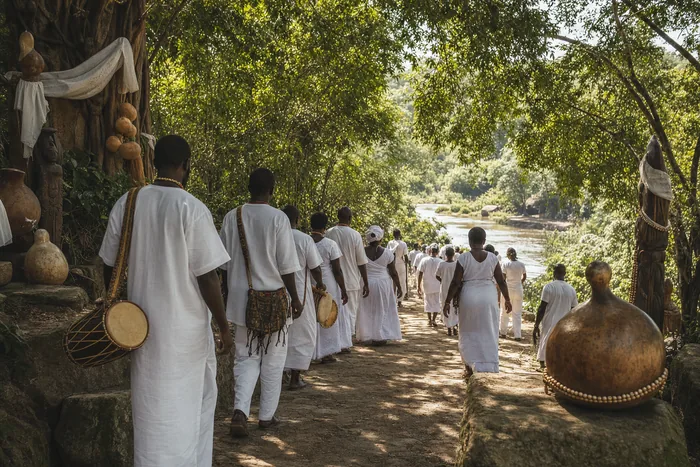 A respectful festival scene inspired by Osogbo, showing people in white attire, beads, drums and river motifs near a sacred grove path.